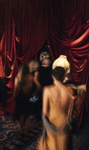 Elegant people arriving to the opera house 